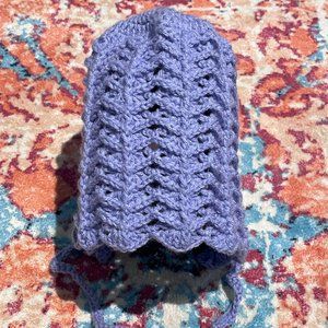 Homemade knitted cap for girl